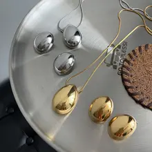 几何学的な楕円形ペンダントのニットネックレス【エレガントなデザイン・色褪せないイヤリング付き】