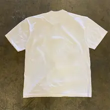重厚感のあるコットン製オーバーサイズTシャツ【原宿風・クリエイティブプリント】