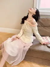 肩紐デザインのウエストシェイプドジャケットスタイル ロングスカート【大きなフレア・女性用】