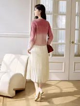 米白色のニットハイウエストスカート【膝下丈・プリーツ・女性用】
