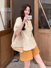 リゾートスタイルの刺繍入りバルーン袖シャツとショートパンツ（セットアップ対応）