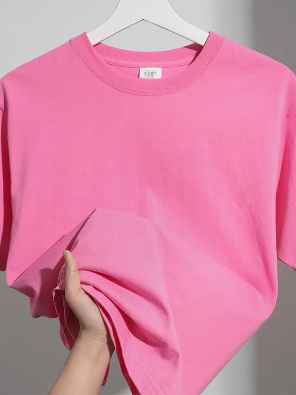 ピンクのアメリカンカジュアルルーズフィットTシャツ：搭念ZH-29550の実用性と着用シーン解析