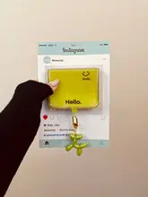 清新なデザインのスマホケース【グリーン・笑顔付き・可愛い犬のチャーム】（セットアップ対応）
