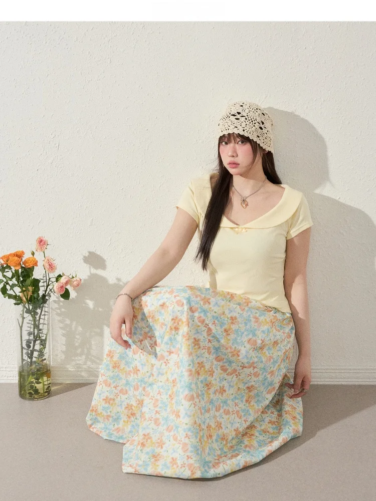 鮮やかなフラワープリントの大きいサイズ半身スカート：夏服に最適な柔らかい素材とデザイン