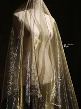 透け感のある金色のオーガンザ生地【華やかなウェディングドレス・和服・子供服デザインに最適】