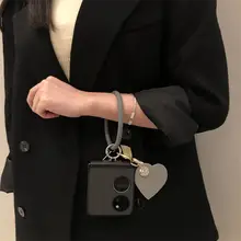 火山灰風ハート型吊り下げタグ付きスマートフォンケース【折りたたみ式・手提げストラップ・防落下設計】