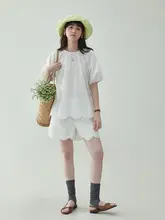 白色刺繍入りカジュアルショートパンツ【女性用・夏用・コットン・フレアシルエット・フリル付き】（セットアップ対応）