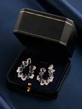 紫色のクリスタルピアス【デザイン感ある高級感・華やか】