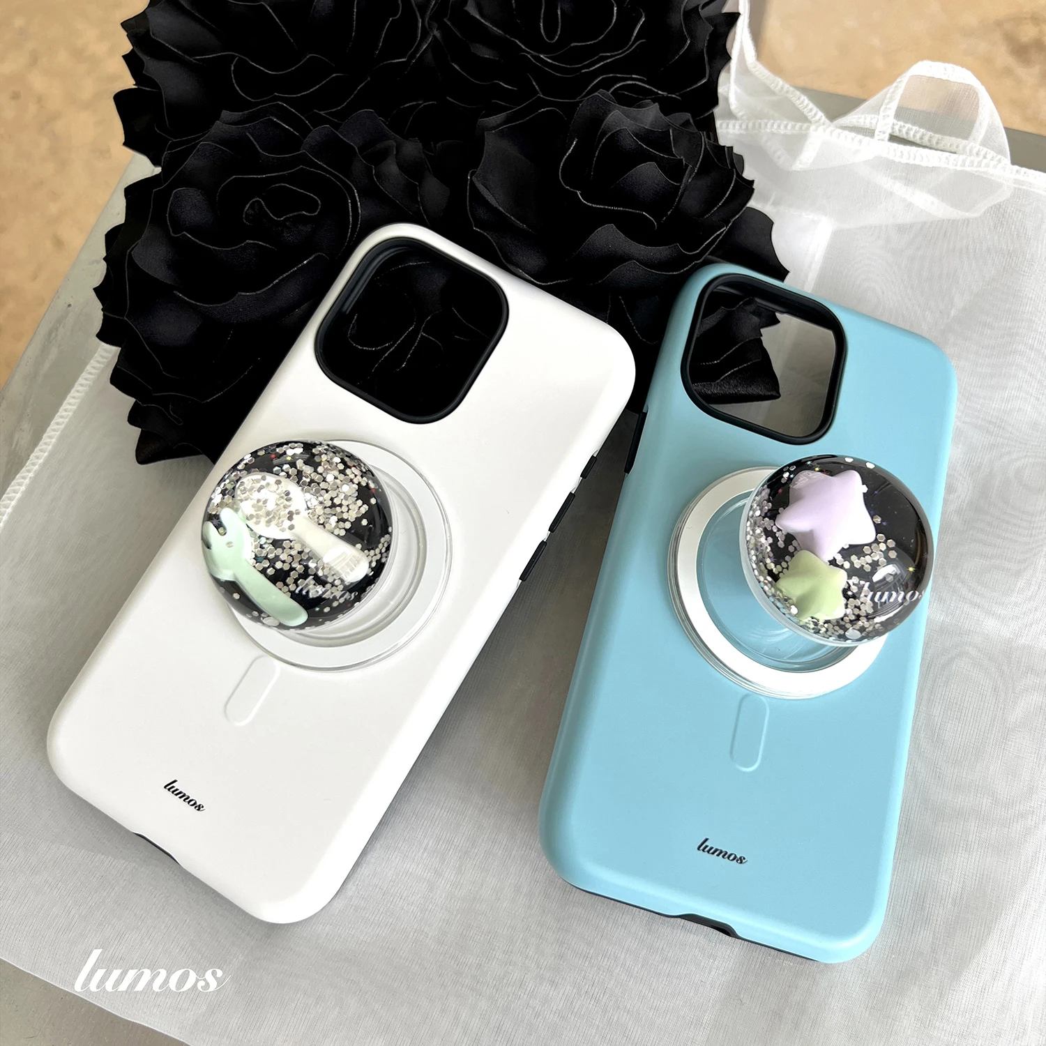 水晶流砂球デザインのスマートフォンケース：マグネットスタンドの使い方と実用性