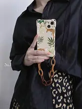 レトロフラワーヒョウiPhone用保護ケース【ストラップ付き・衝撃吸収・14Plus・12Pro Max・11対応】