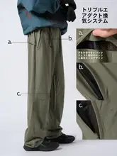 Zuoshan カスタマー アウトドア ソフト シェル アウターパンツ 男性と女性のための同じスタイル