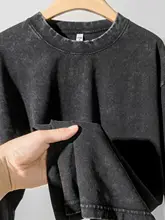 水洗加工のブラックコットン長袖Tシャツ【ゆったりシルエット・秋用・ラウンドネック】