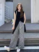 デザイン感あふれるカジュアルノースリーブトップ【レトロな雰囲気・ファッション・ワイドパンツ】（セットアップ対応）