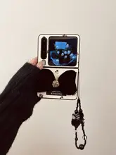 折りたたみ式スマートフォンケース【白地に黒のフラワーパターン・リボン付き・個性的デザイン・対応機種多数】