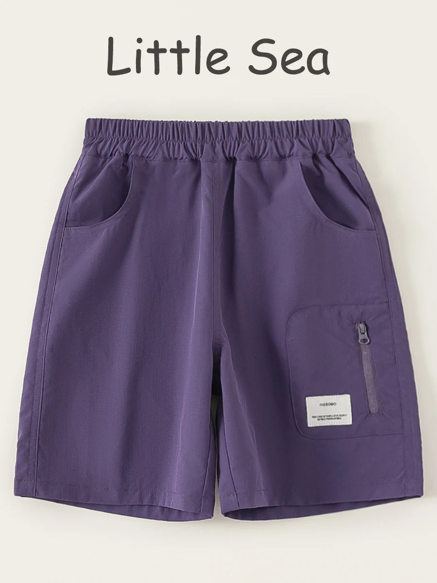 夏用メンズ工装風ジッパーショートパンツ：カジュアルなゆったりフィットで快適な夏コーデを実現