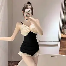 高級感あるデザインの黒いワンピース水着【控えめなスタイル・体型カバー・リゾート用】