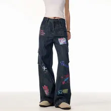 春のアメリカンビンテージ風切手プリント多ポケットワークデニムパンツ【ゆったりとしたフレアストレートシルエット】