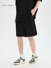 シンプルな無地の肌理タッチのメンズカジュアルポロシャツとショートパンツ（セットアップ対応）