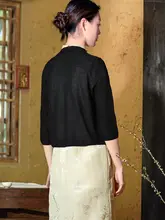 軽やかな羽根模様の黒色チャイナドレス風カーディガン【毛織り・開放的なデザイン】