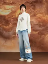 民族風刺繍が施された冬用フリース入りストレートデニムパンツ