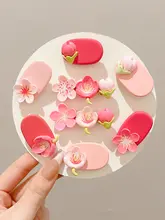 優しいピンク色のポンポンヘアクリップ【サイドクリップ・少女向け・前髪用】