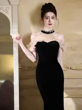 洗練されたデザインの黒いフィッシュテールドレス【エレガント・成人用・パーティー向け】