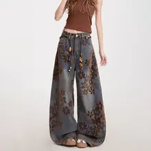 花柄フロッキー付きデニムパンツ【アメリカンデザイン・ウォッシュ加工・レトロ・ワイドレッグ】