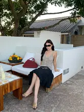 アート感溢れるデザイン！褶皺加工の膝丈Aラインスカート【ブラック・女性用・フレア】
