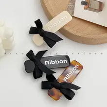 ヘアクリップ バネクリップ 蝶結び べっ甲柄 ミニ 髪量少なめ ハーフアップ 韓国製「ribbon」