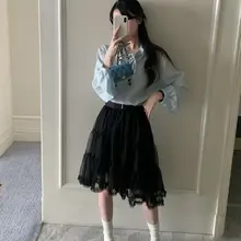 木耳フリルデザインのゆったり長袖ブラウス【優しい雰囲気・リボン付き】