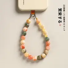 菩提デザインのスマホ用ハンドストラップ【女性向け・精緻な装飾・ビーズ付き】