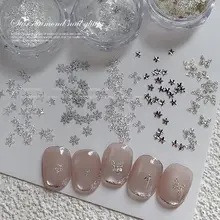 クリスマスデザインの雪花型ホワイトグリッター＆蝶々星型ネイルパーツ