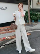 米色の女性用高級感あるフラワーレースビスチェと短袖トップス、ワイドパンツの三点セット（セットアップ対応）