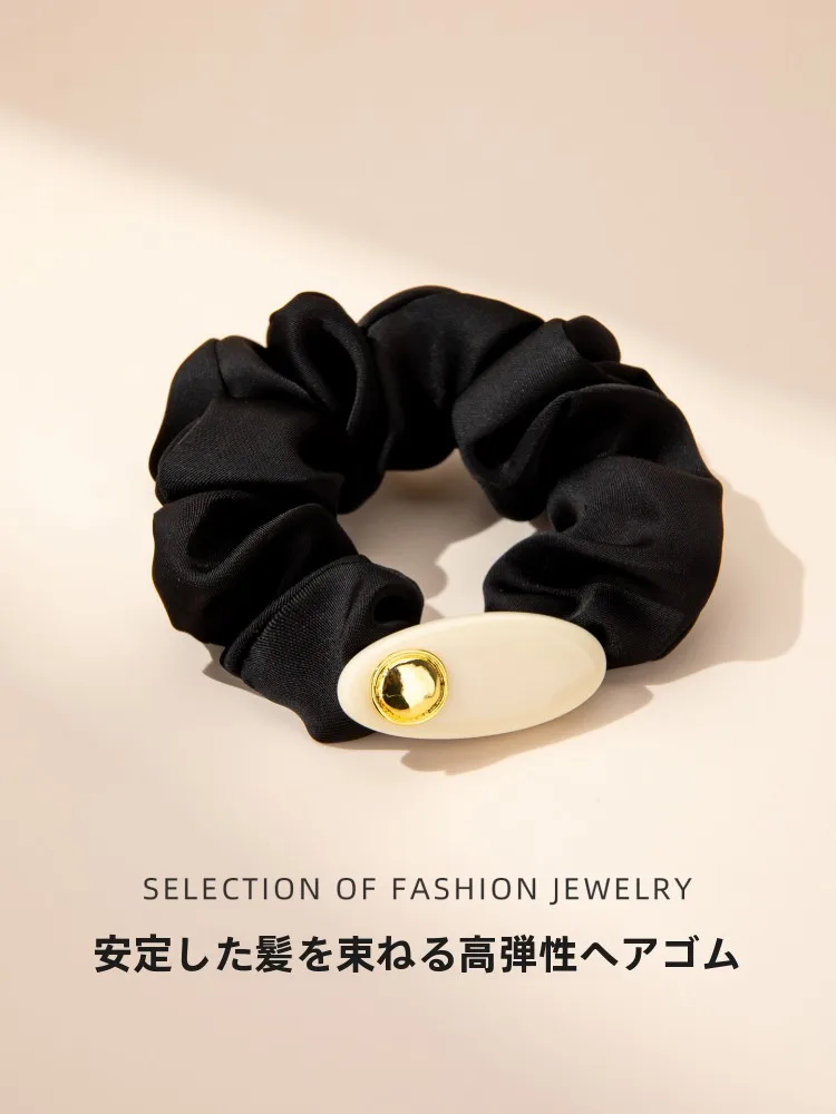 起き上がりこぶしとは？大腸ヘアゴムで実現する日韓風お団子ヘアの安定性と使いやすさ