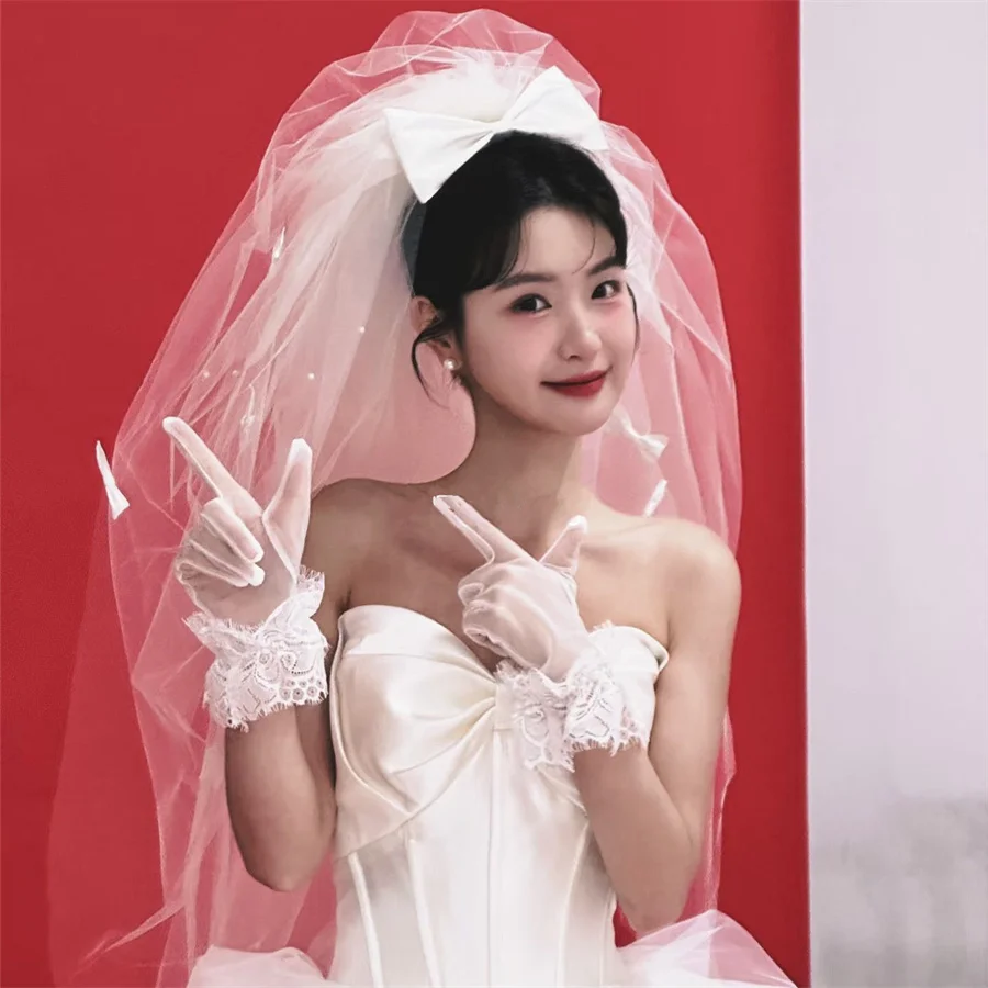 大きなリボン付きロングベール：ハードチュールヘッドドレスの手芸用途と実用性