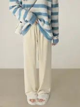 リラクシングデザインのホワイトストレートパンツ【秋冬用・ゆったりサイズ・女性用】