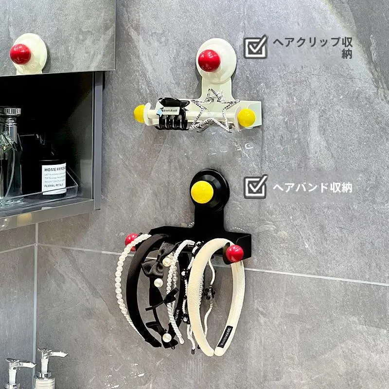 デザイン性の高い吸盤式トイレットペーパー掛け：北欧風馬カロン色で空間を彩る