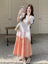 感あるレース切り替えTシャツとチェック柄ロングスカートの夏用コーディネート（セットアップ対応）