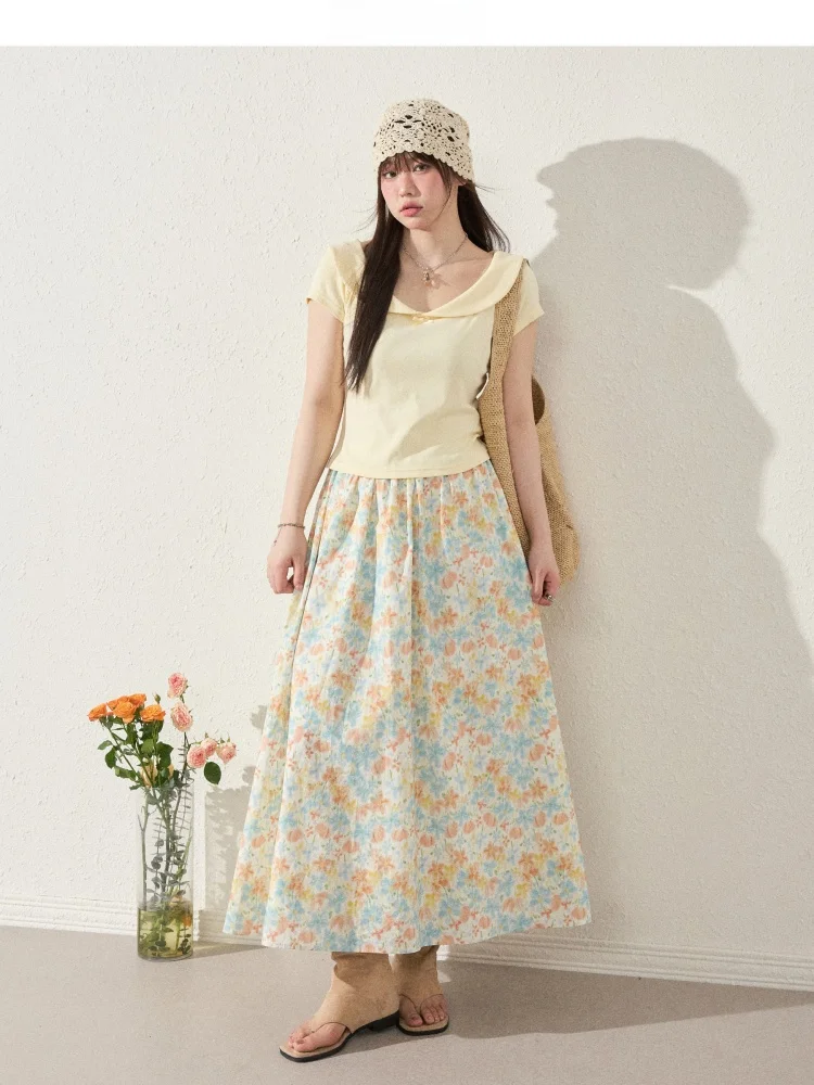 鮮やかなフラワープリントの大きいサイズ半身スカート：夏服に最適な柔らかい素材とデザイン