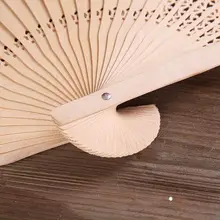 手作り檀香木折り扇【古風・精緻な透かし彫りデザイン】