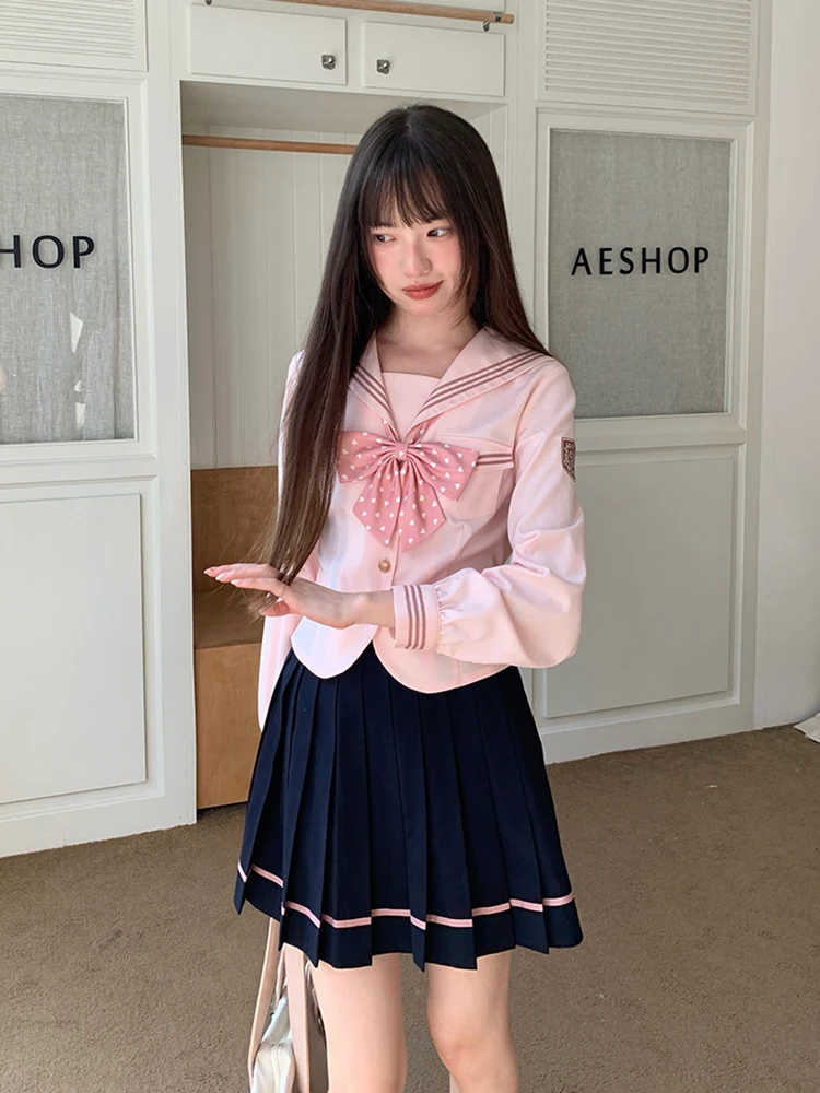 春のピンクJK制服：学院風セーラー服と百褶スカートのセットアップ対応スタイル