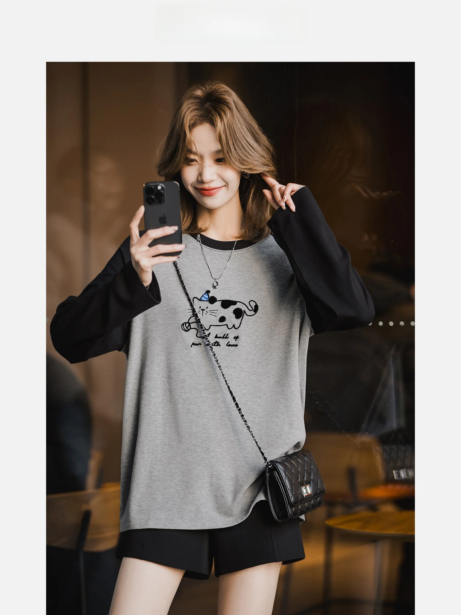 ショッキングピンクの長袖Tシャツ：グレーと黒のステッチで日常を彩る