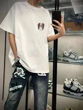 高品質コットン製 赤光魔剣と翼のデザインTシャツ【男女兼用・夏用・ゆったりフィット】