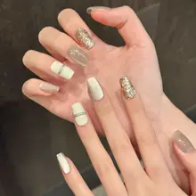 美しい光沢のあるネイルチップ【クリームホワイト・シャンパンゴールド・キャットアイデザイン・ショートタイプ・手作り】
