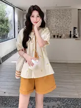 リゾートスタイルの刺繍入りバルーン袖シャツとショートパンツ（セットアップ対応）