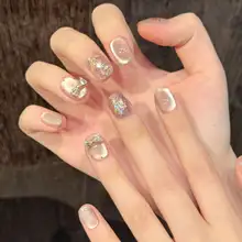 ドット柄のキャットアイデザイン 蝶結びつきマニキュア【ハンドメイド・短丈・美白効果】