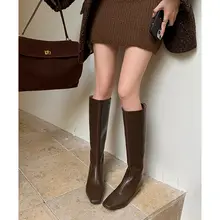 真皮製 ブラックロングブーツ【平底・後ろファスナー・ハイカット・スリム効果】