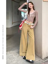 カキ色のデザイン感あるワイドレッグデニムパンツ【高腰・フレアスタイル・春用】