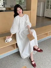清楚で美しい白のロングドレス【春秋向け・ユニークデザイン】