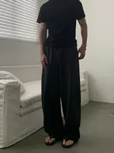 シンプルなドレープのカーブパンツ【男女兼用・カジュアル・ルーズフィット】（セットアップ対応）